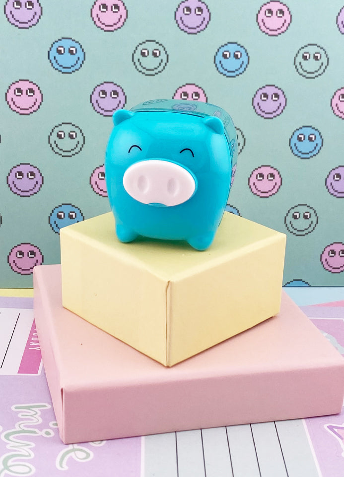 TAILLE-CRAYONS PETIT COCHON TURQUOISE